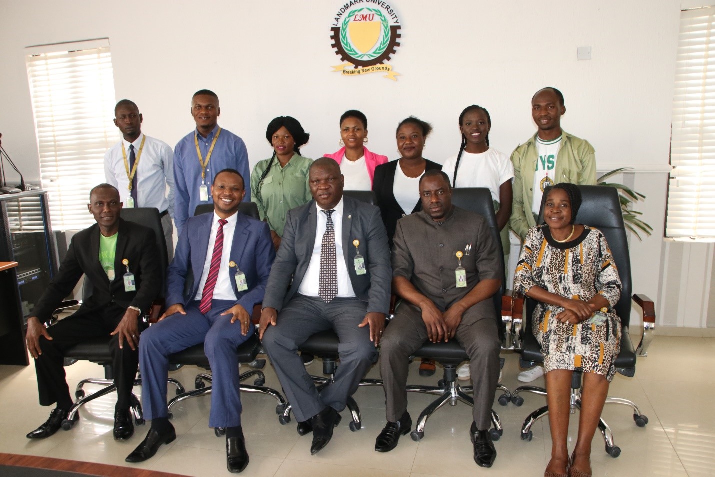 Members of Management led by the Vice-Chancellor Professor Adeniyi Olayanju (Front middle) in a group photograph with the 2016 Batch ‘B’ Stream II Corps members during their sent-forth ceremony