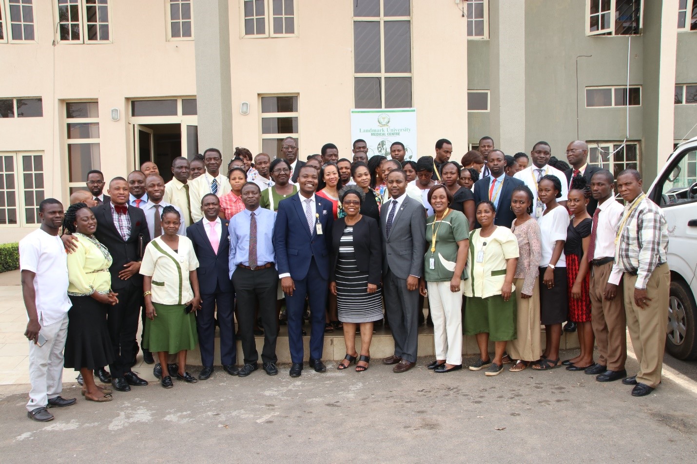 Members of the University Medical Centre led by the Ag. Medical Director, Dr. Joseph Olisa in a Group Photograph with Professor Unuigbe