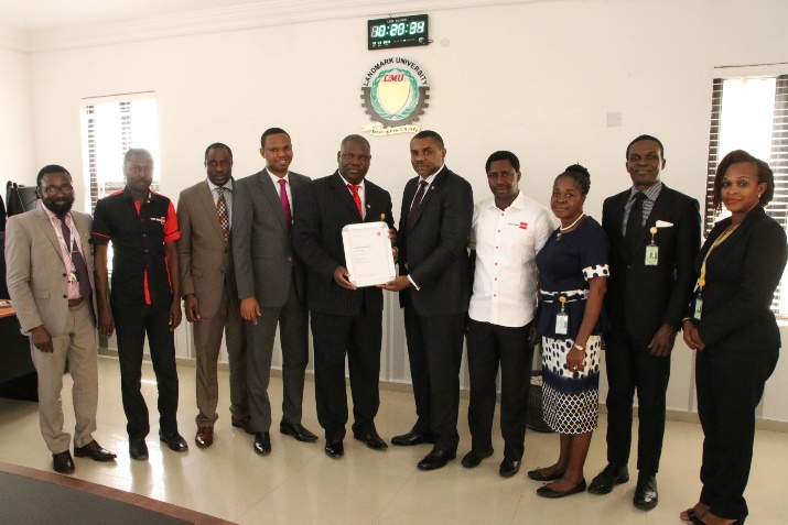 The Vice-Chancellor, Professor Adeniyi Olayanju and other members of management in a group photograph with the ACCA team.