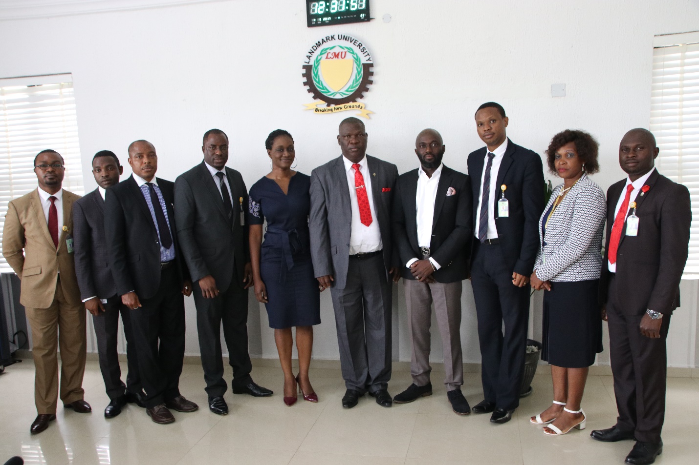 The Iddo Care team in a group photograph with Landmark University Management after the meeting