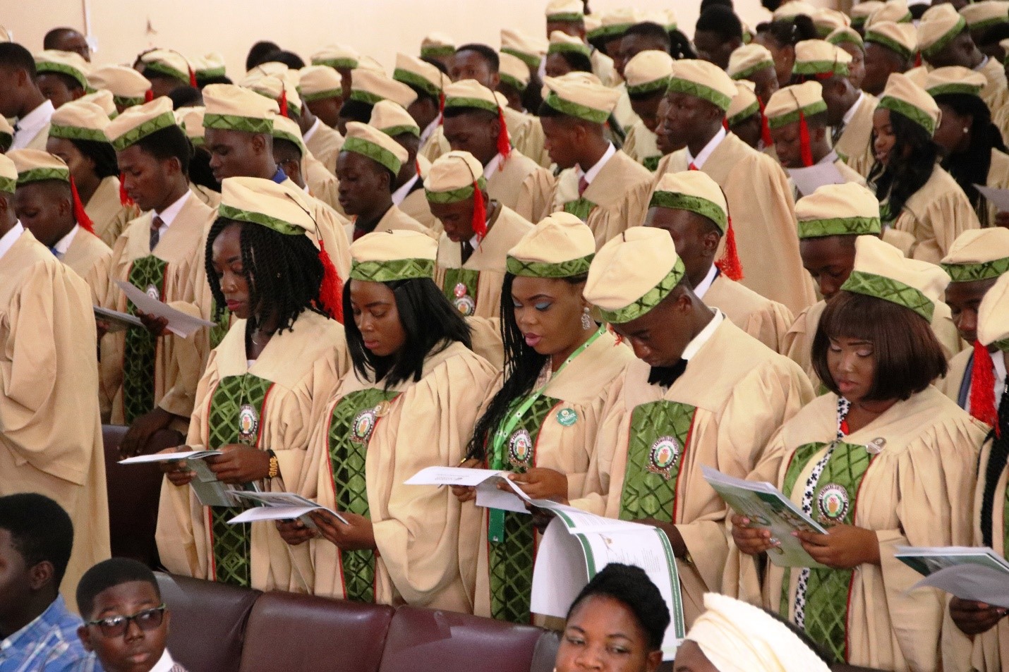 Students signing the oath document at the 8th Matriculation Ceremony.