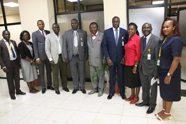 Members of Management in a group photograph with representatives of Winteck Limited